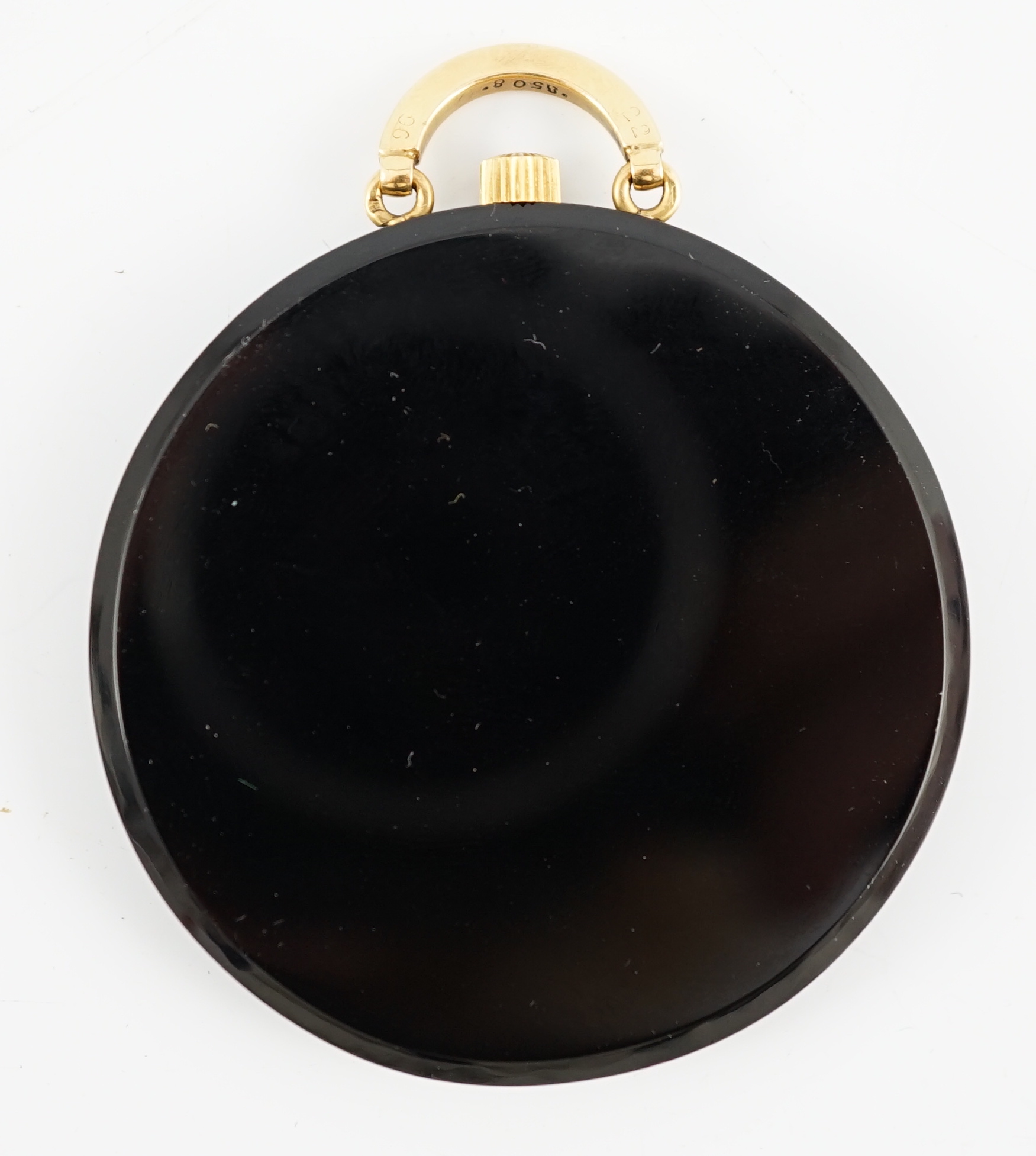 A good 1920's French Cartier black onyx, enamel and 18ct gold circular pocket watch